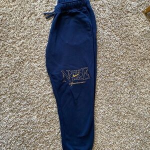 Nike Women's Navy Joggers with Gold Logo